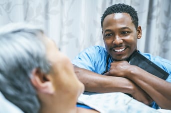 GettyImages-906006644-Doctor_Talking-to_Patient-RET